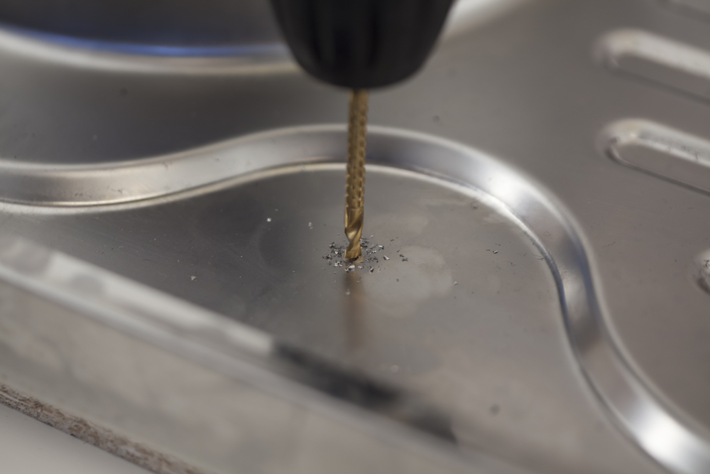 How to drill a hole in your steel sink